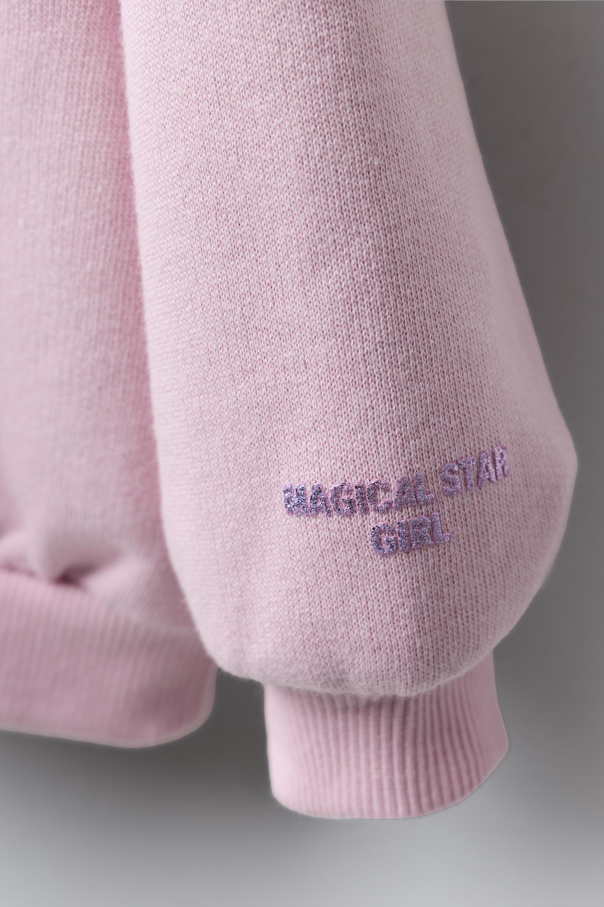 RAISED SHINY STAR SWEATSHIRT